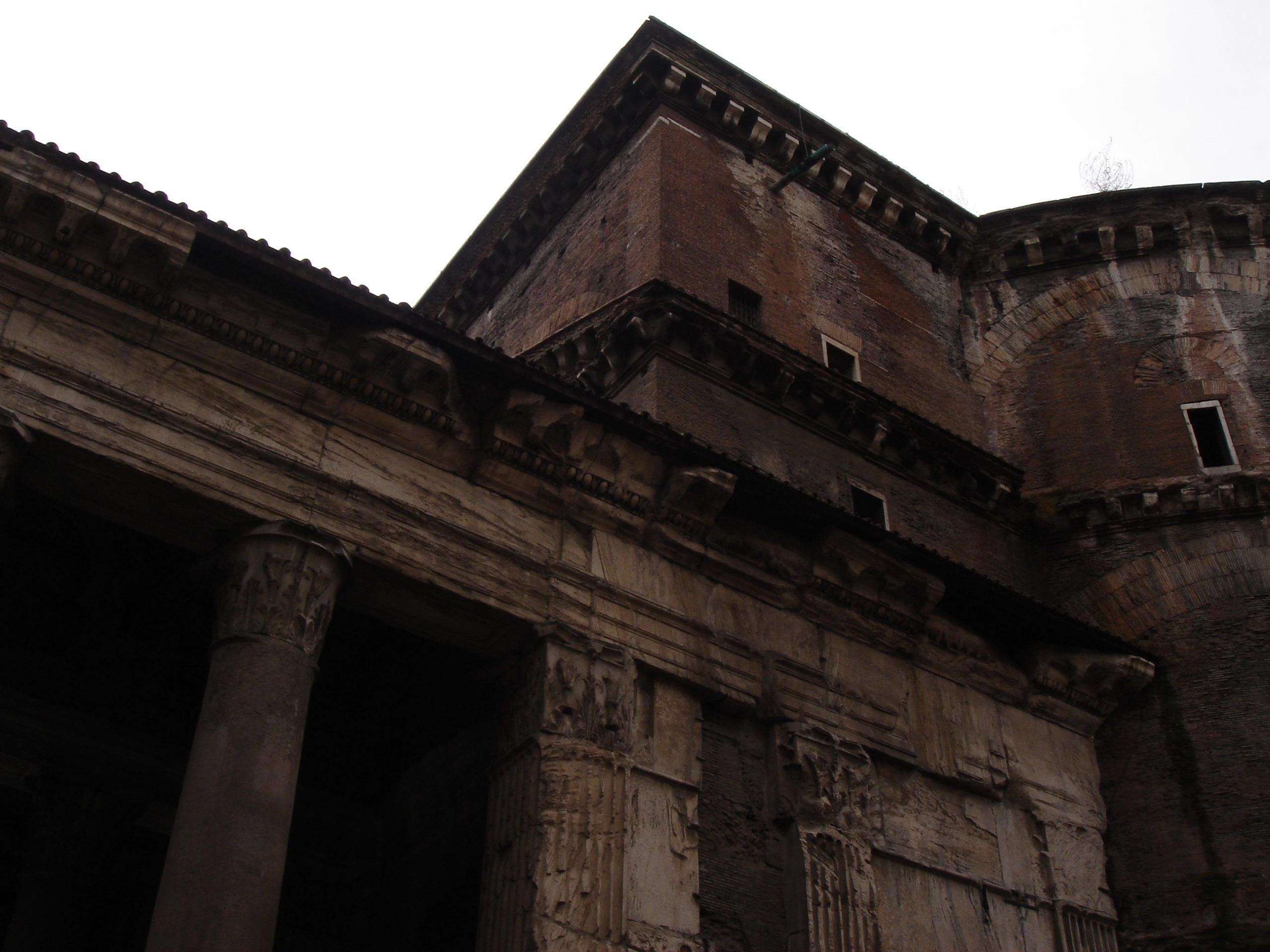 Exterior rear view of the Pantheon showing the drum, brickwork, and entablature.