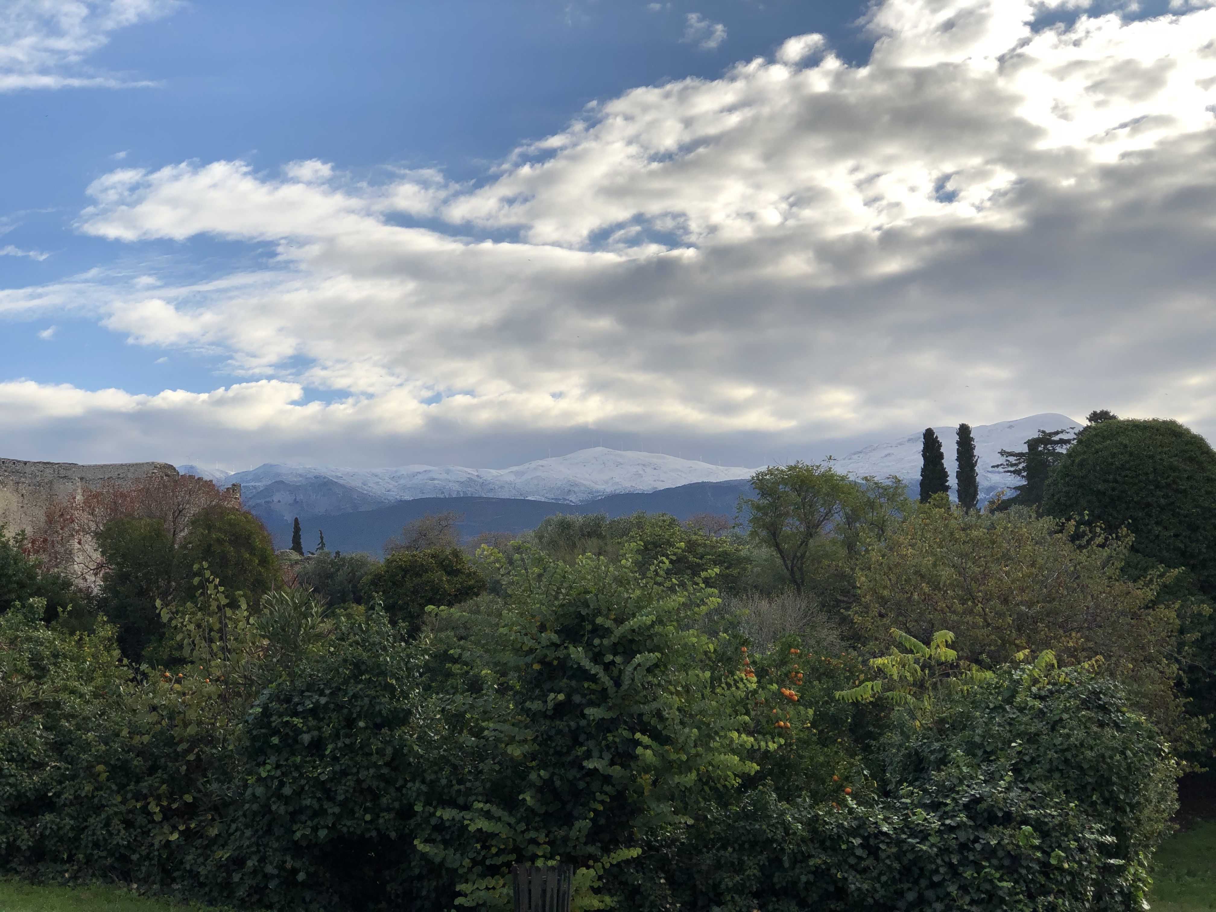 Looking from the Byzantine castle away from the sea and towards snow-covered mountains far in the distance.