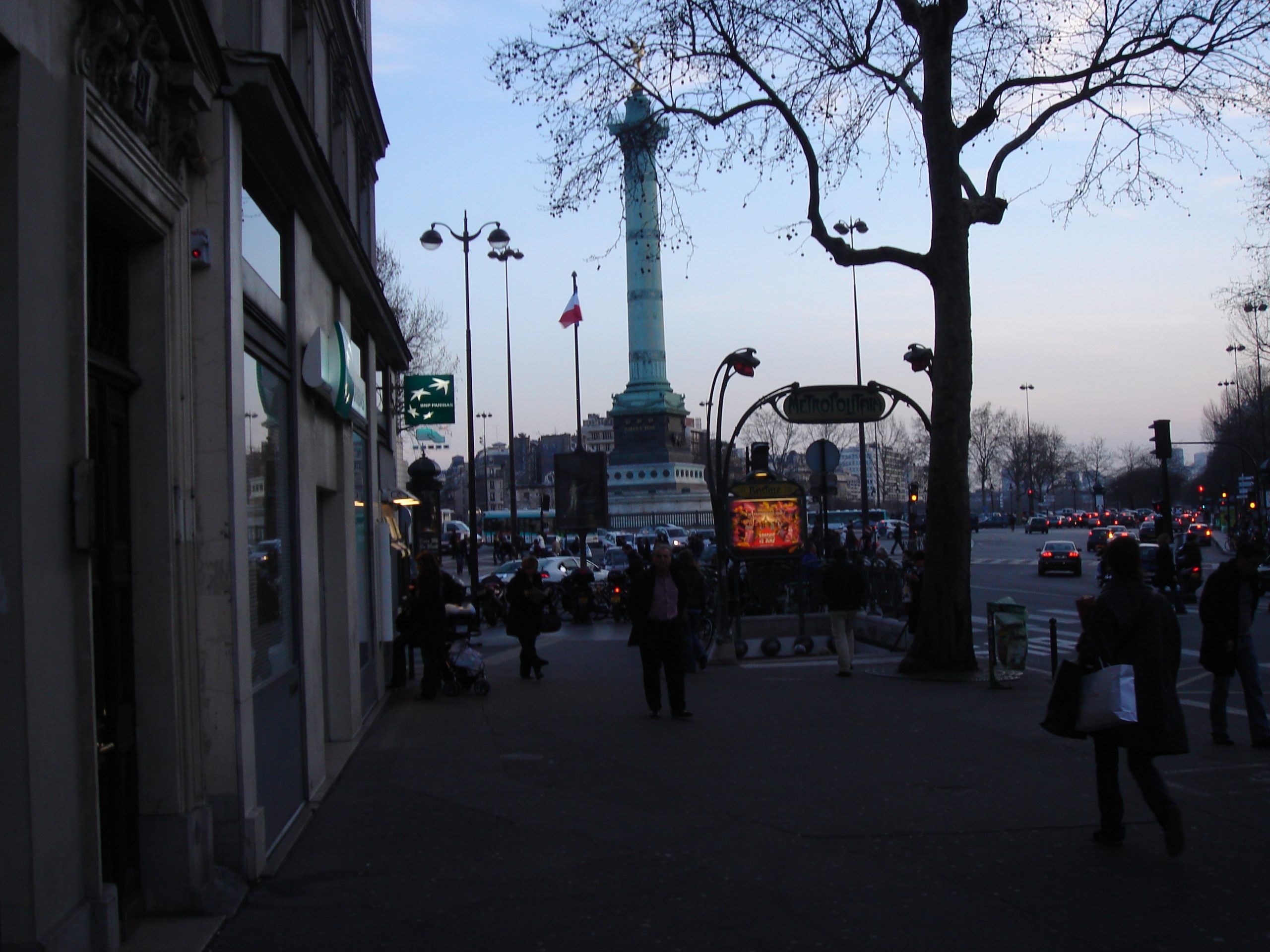 Street scene in Paris looking toward the July Column in the Place de la Bastille.