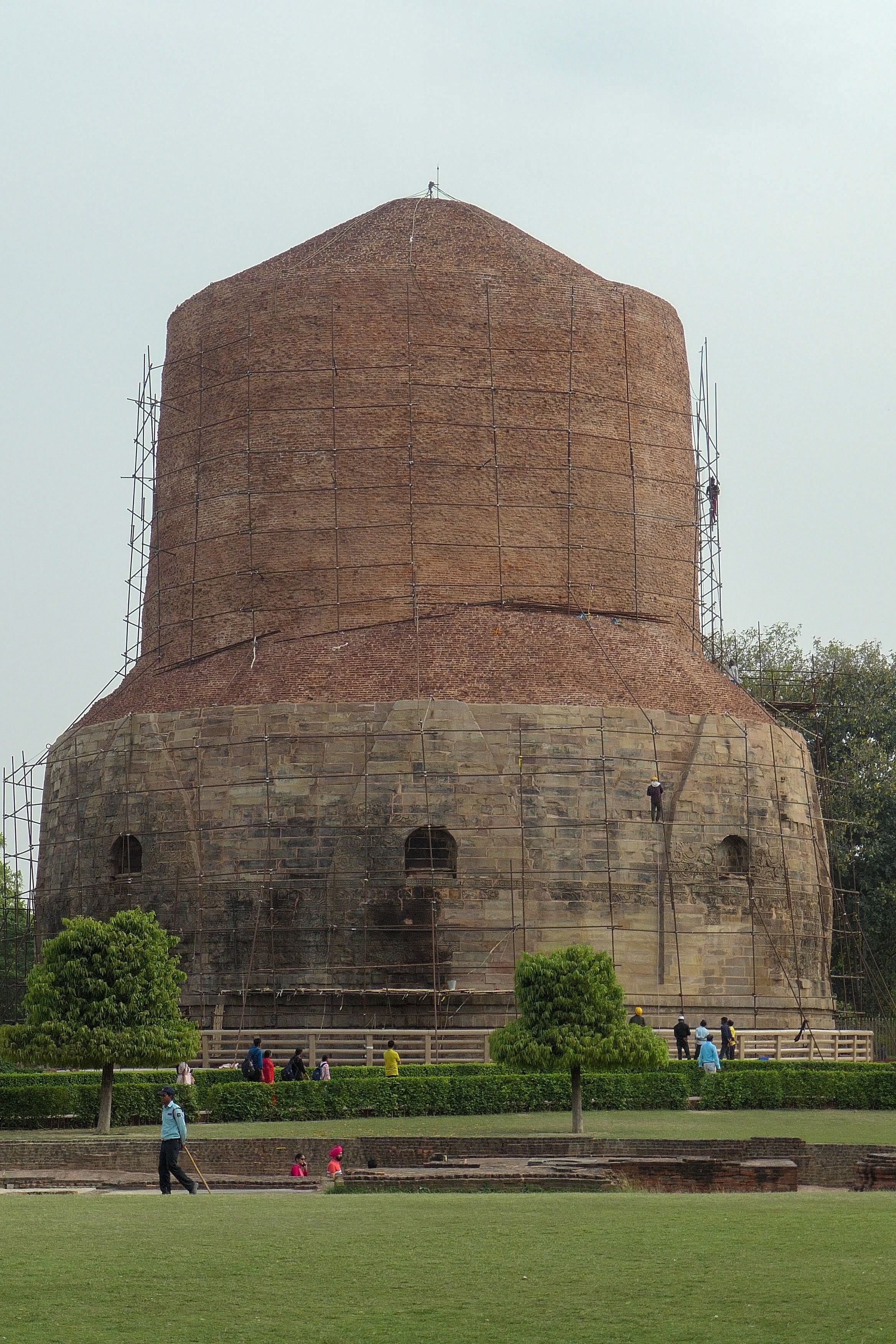 The massive Dhamek Stupa at Sarnath, encased in scaffolding during restoration work.
